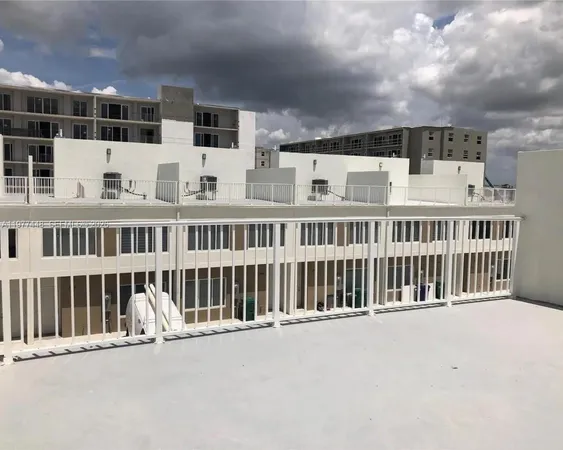 a view of a house with a roof deck