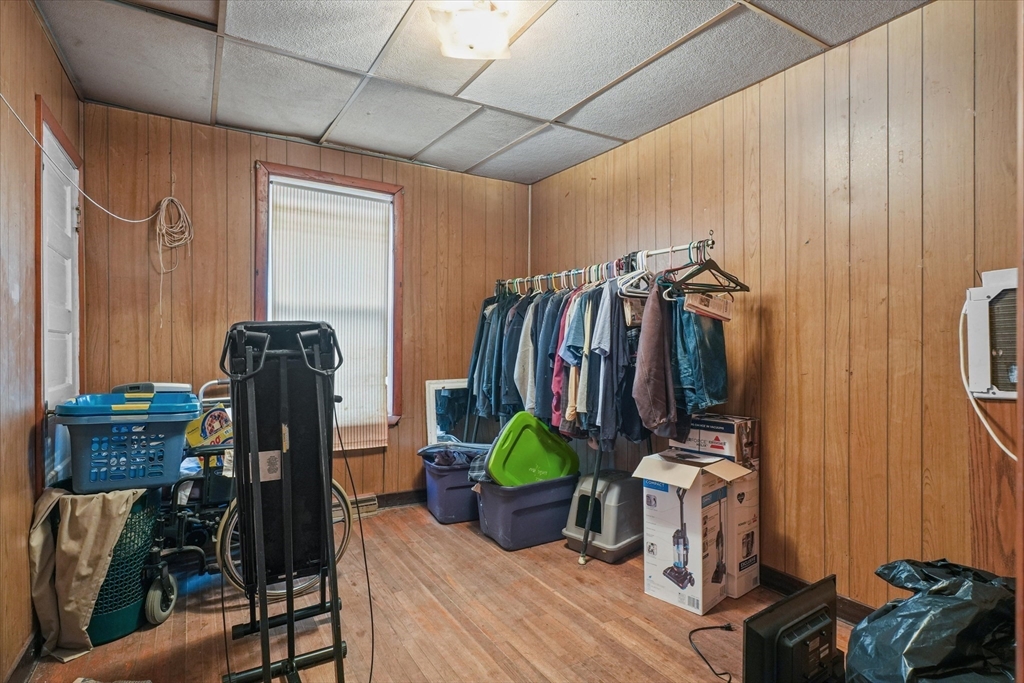 5-7 Arlington Terrace Lawrence, MA 01841 - Photo 12 of 39 a view of a room with furniture and gym equipment