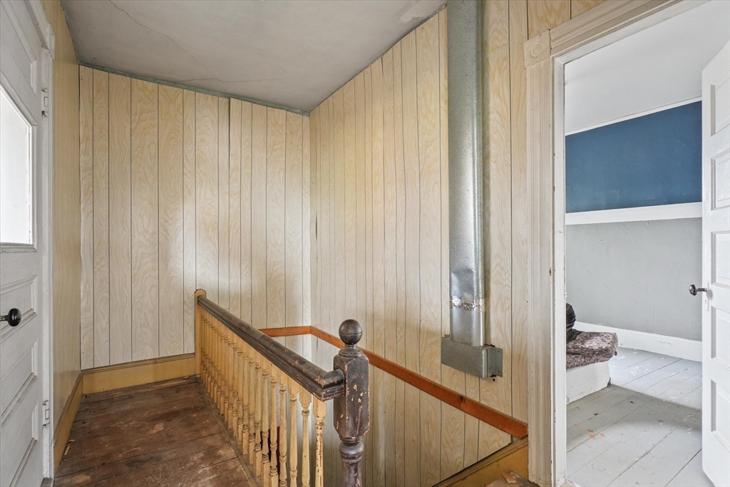5-7 Arlington Terrace Lawrence, MA 01841 - Photo 21 of 39 a view of a hallway with a room