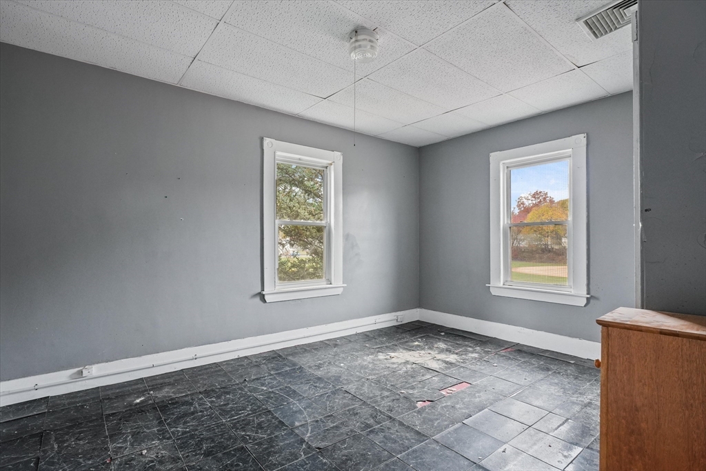 5-7 Arlington Terrace Lawrence, MA 01841 - Photo 29 of 39 a view of an empty room with a window
