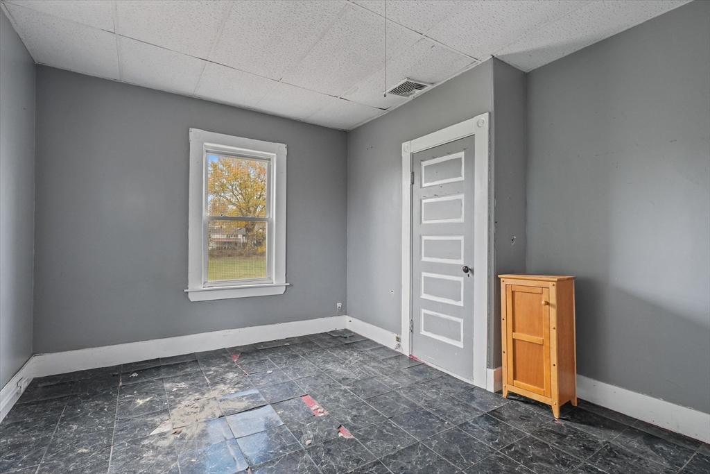 5-7 Arlington Terrace Lawrence, MA 01841 - Photo 30 of 39 a view of an empty room and a window