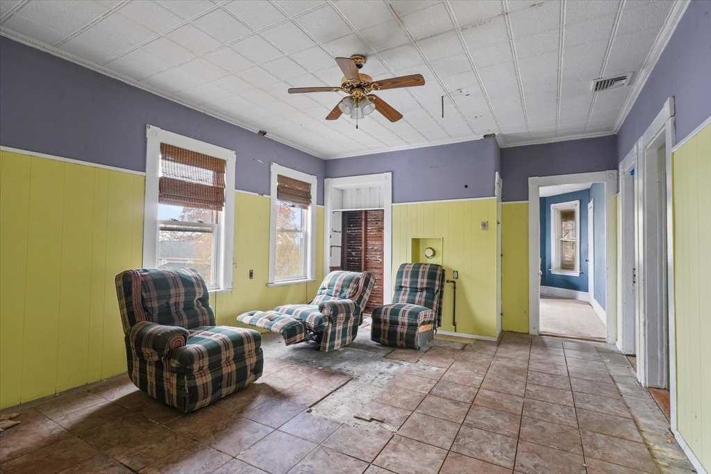 5-7 Arlington Terrace Lawrence, MA 01841 - Photo 32 of 39 a living room with furniture and a window