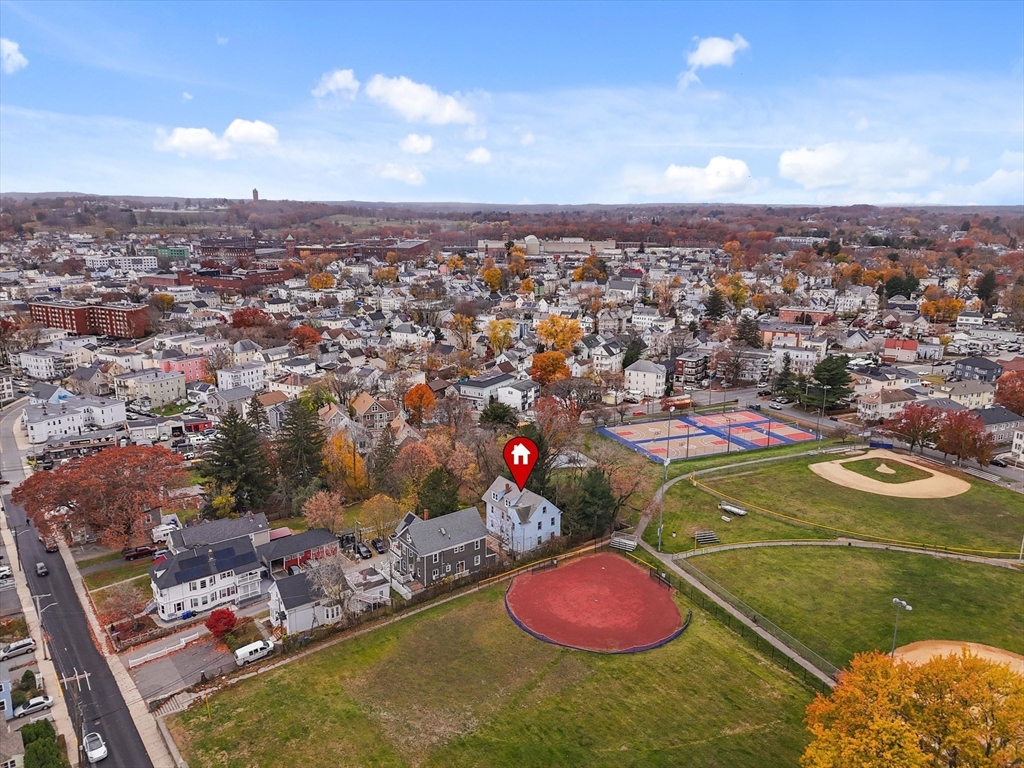 5-7 Arlington Terrace Lawrence, MA 01841 - Photo 36 of 39 an aerial view of a pool residential houses with outdoor space