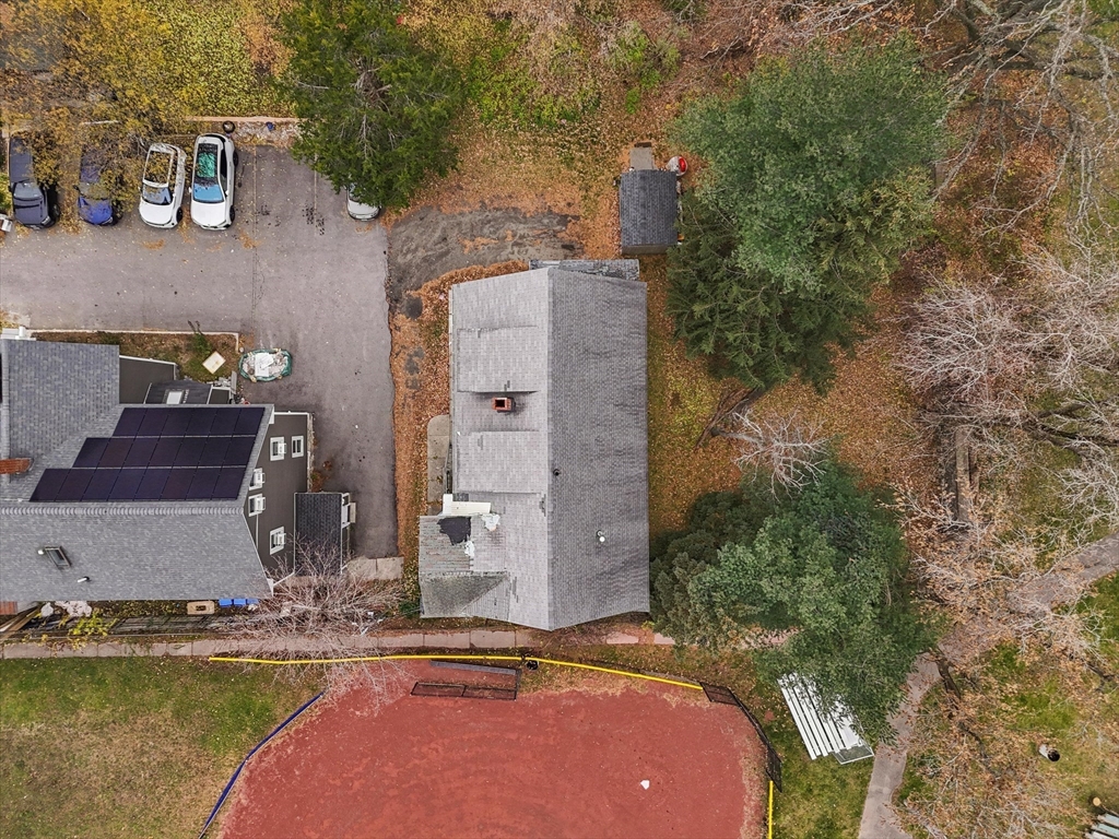 5-7 Arlington Terrace Lawrence, MA 01841 - Photo 5 of 39 an aerial view of a house with outdoor space