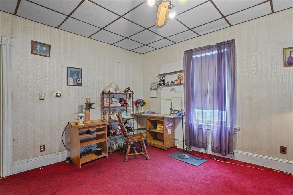5-7 Arlington Terrace Lawrence, MA 01841 - Photo 9 of 39 a view of a room with gym equipment