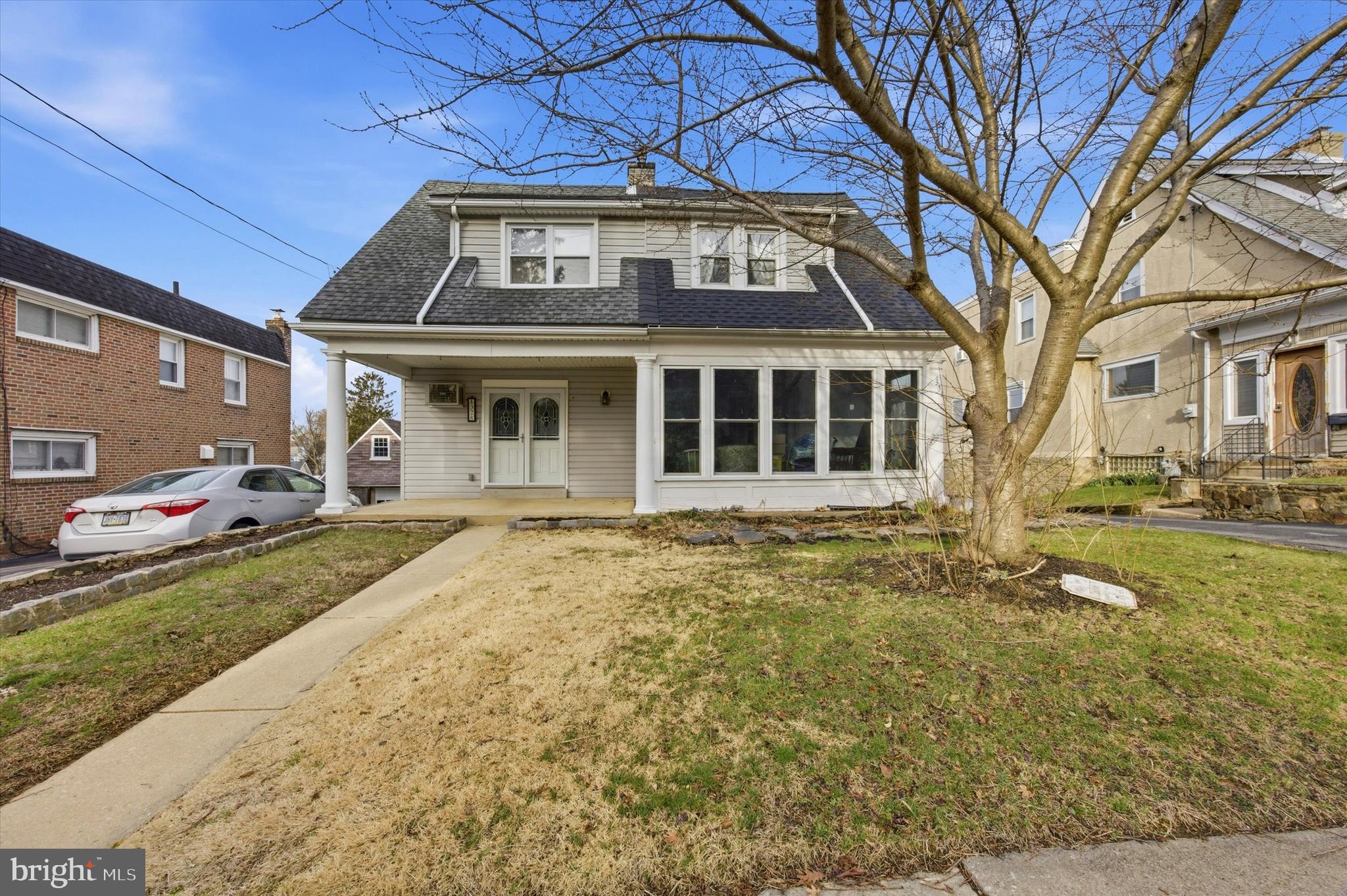 328 Blanchard Road Drexel Hill, PA 19026 - Photo 1 of 1 a front view of a house with garden