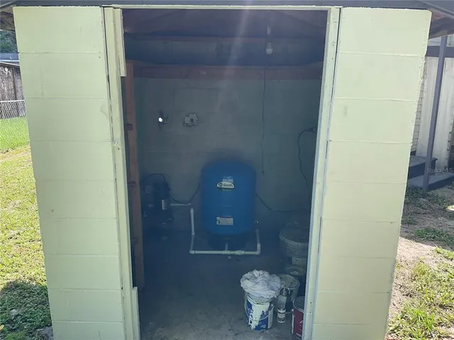 a backyard of a house with yard and garage