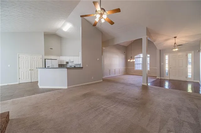 a view of a kitchen with a sink and cabinet