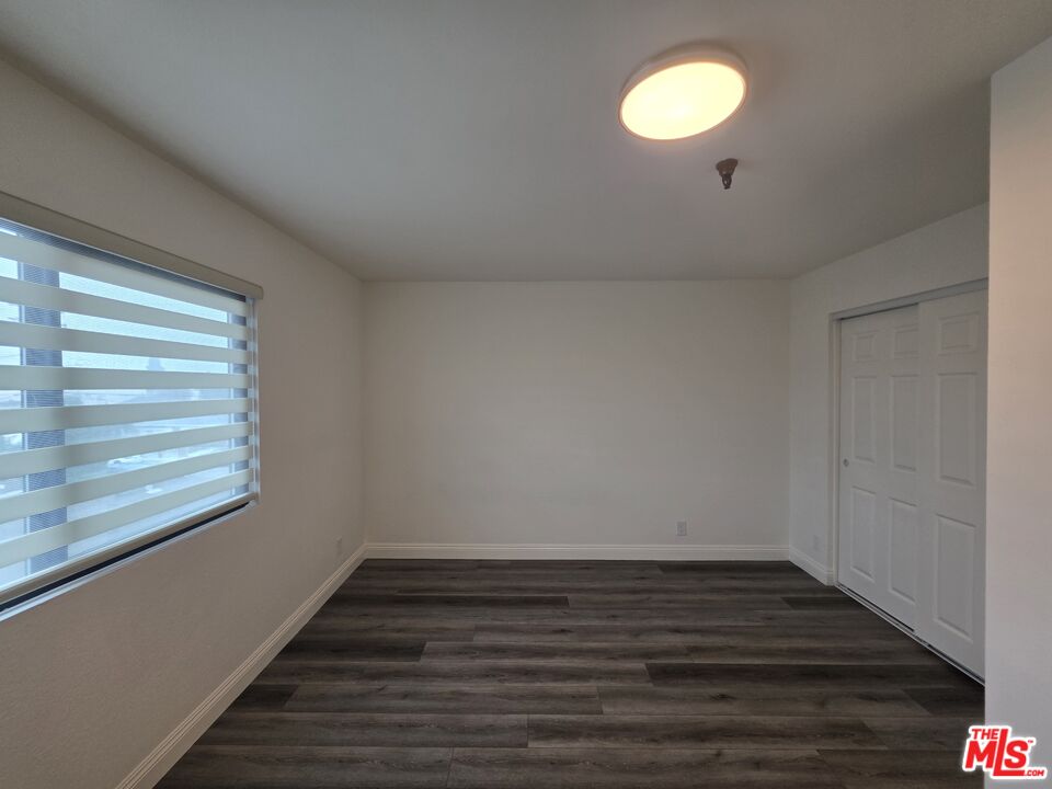 3204 139th Street, Unit 6 Hawthorne, CA 90250 - Photo 24 of 37 a view of a room with wooden floor and window