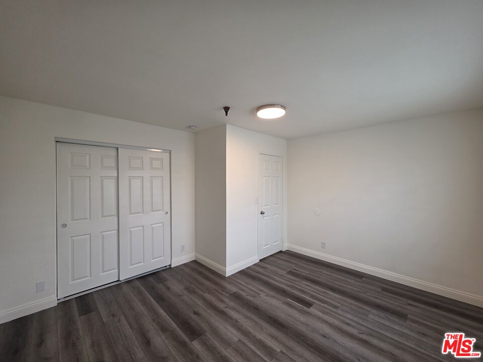 3204 139th Street, Unit 6 Hawthorne, CA 90250 - Photo 27 of 37 a view of empty room with wooden floor