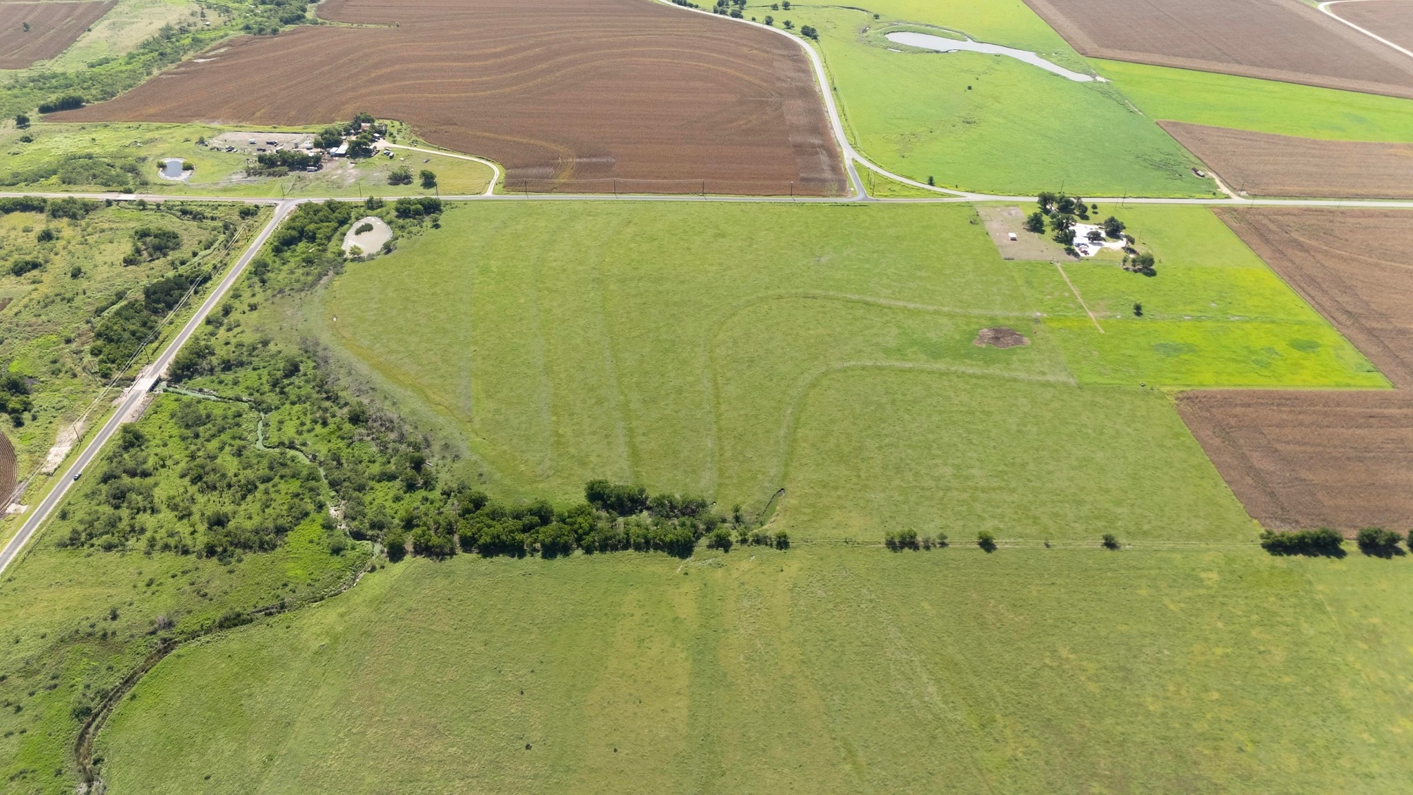 Lot 4 Indian Creek Road Bartlett, TX 76511 - Photo 9 of 10 Aerial view of sparsely populated area with large plots for crops