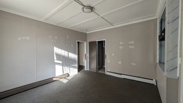 an empty room with windows