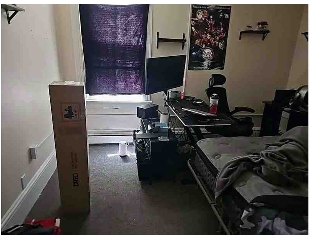 86 West Main Street North Adams, MA 01247 - Photo 19 of 35 a bed sitting in a bedroom next to a window