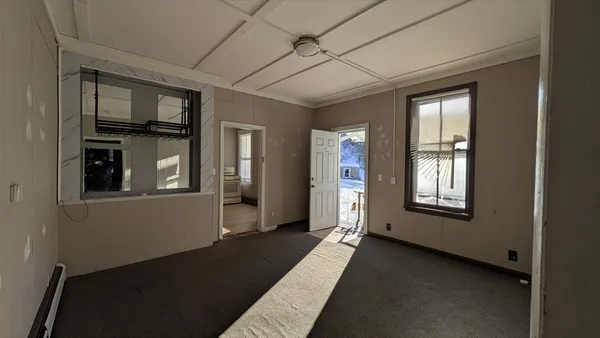 an empty room with windows