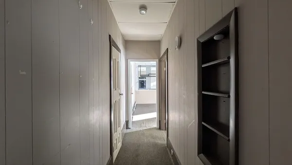 a view of hallway with stairs
