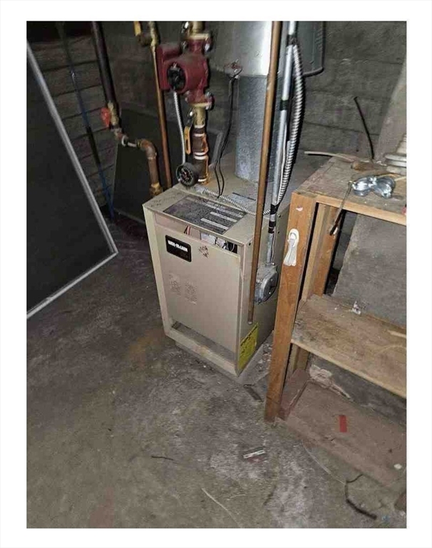 86 West Main Street North Adams, MA 01247 - Photo 28 of 35 a view of water heater room