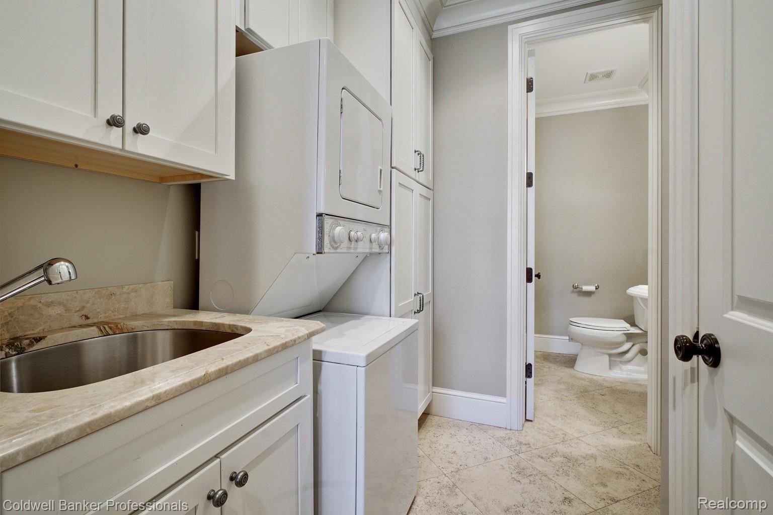 350 Aspen Road Birmingham, MI 48009 - Photo 18 of 60 Mud room suite includes a 2nd laundry room and powder room