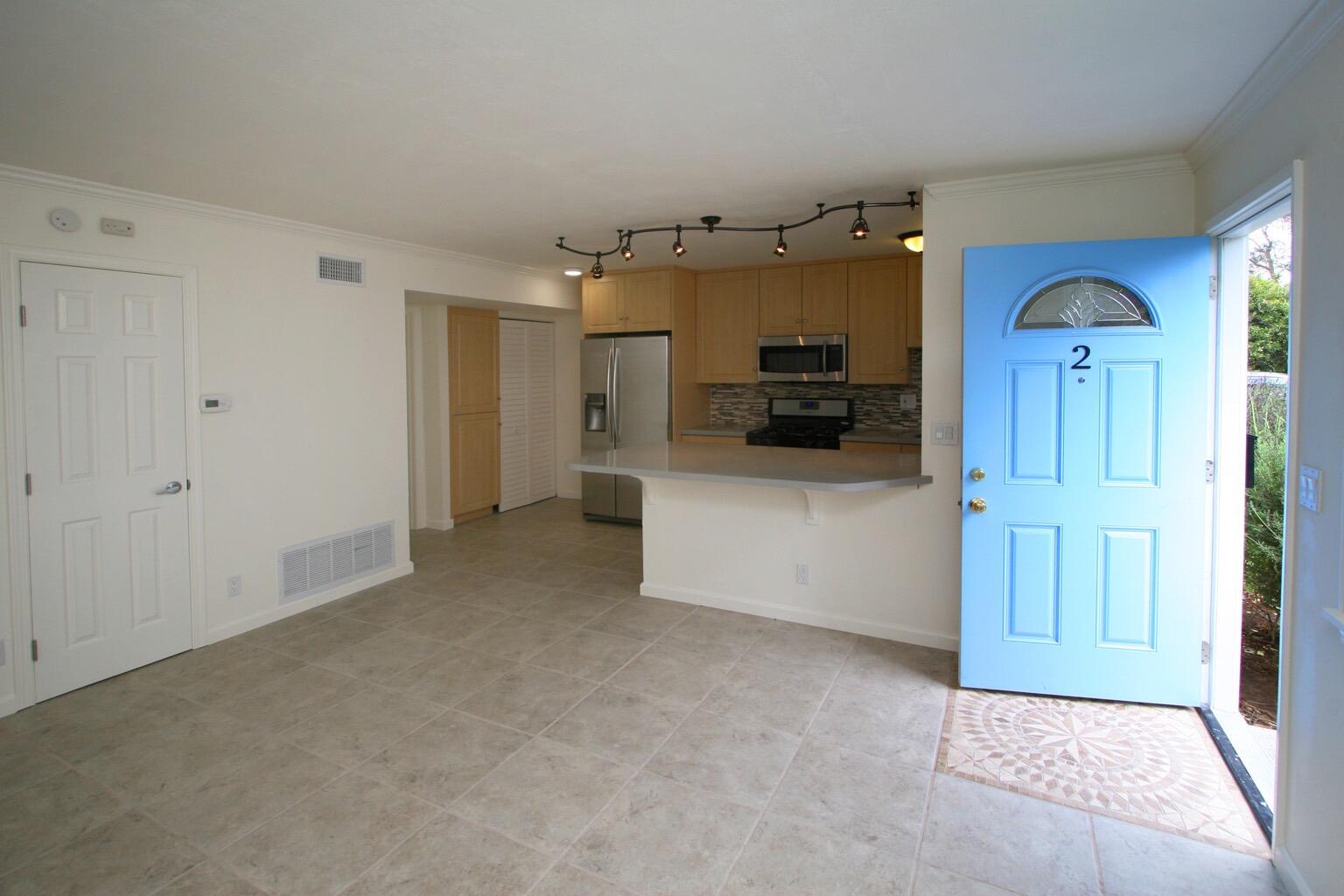 415 Rancheria Street, Unit 4 Santa Barbara, CA 93101 - Photo 3 of 9 a view of a utility room with a sink