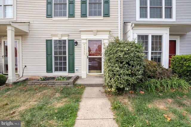a house with yard in front of it