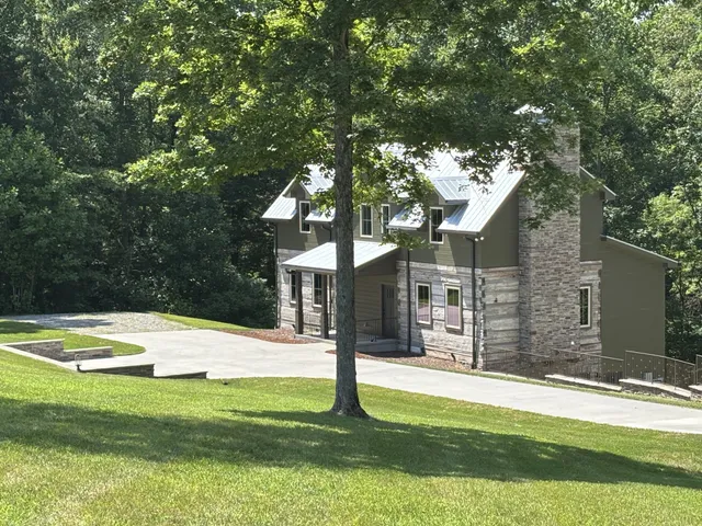 a house with garden in front of it