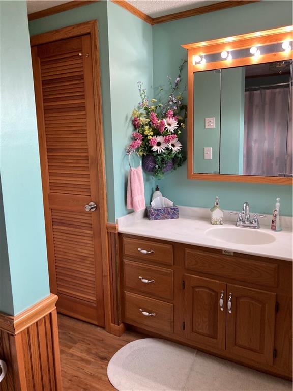 26 Paxton Road Sandy Lake, PA 16145 - Photo 8 of 23 a bathroom with a sink vanity and mirror