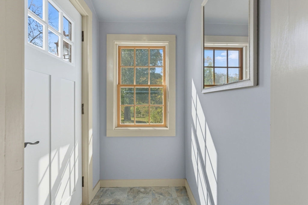 227 Boston Road Groton, MA 01450 - Photo 17 of 42 a view of an entryway with a window