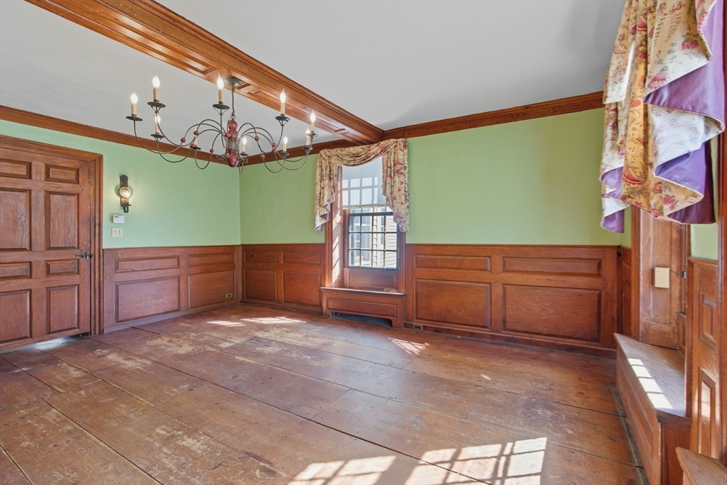 227 Boston Road Groton, MA 01450 - Photo 19 of 42 a view of a room with furniture and a large window