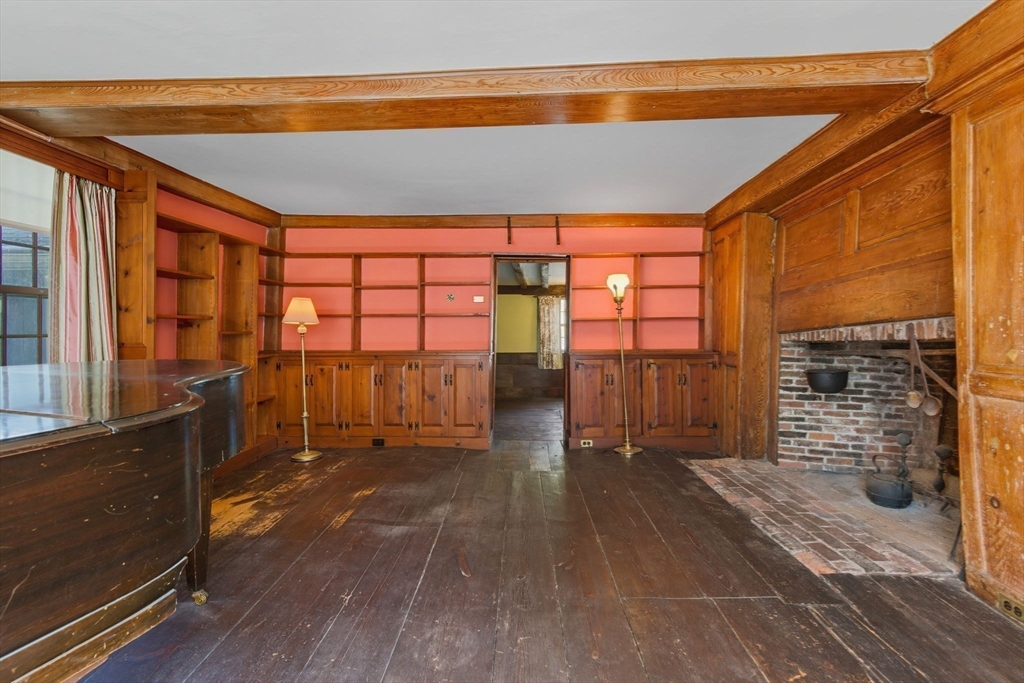 227 Boston Road Groton, MA 01450 - Photo 22 of 42 a view of empty room with wooden floor and fan