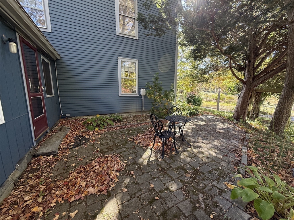227 Boston Road Groton, MA 01450 - Photo 6 of 42 a view of a backyard