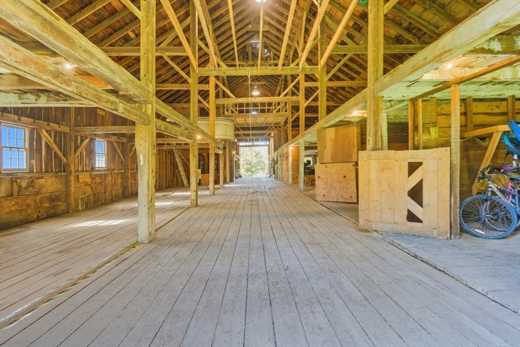 227 Boston Road Groton, MA 01450 - Photo 10 of 42 a view of a room with wooden floor