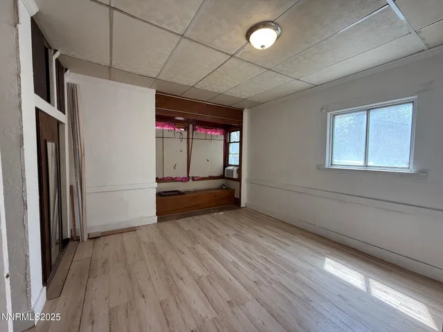 a view of a livingroom with wooden floor