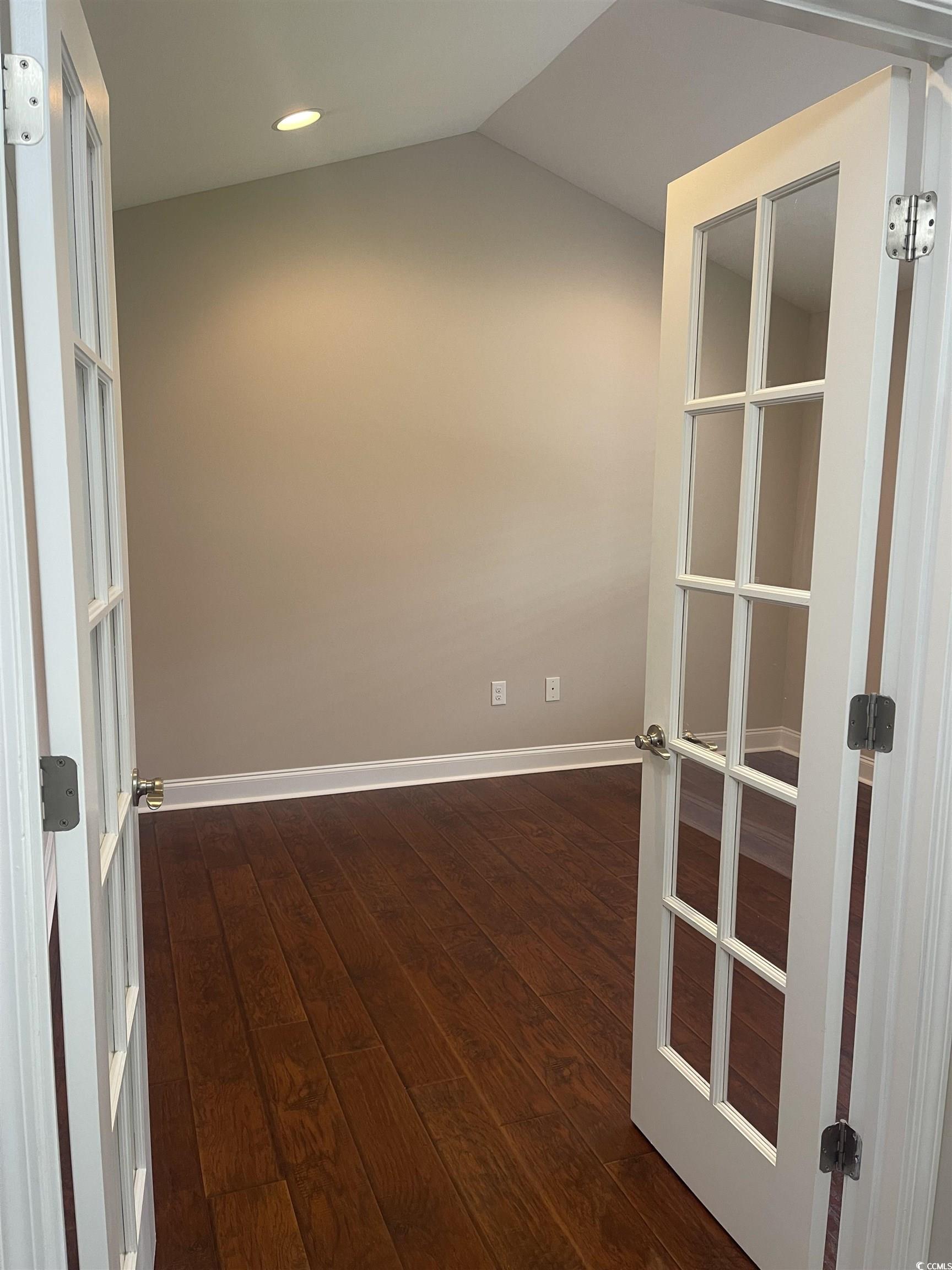 128 Cloey Road Myrtle Beach, SC 29579 - Photo 11 of 22 Empty room featuring french doors, dark wood finished floors, and recessed lighting