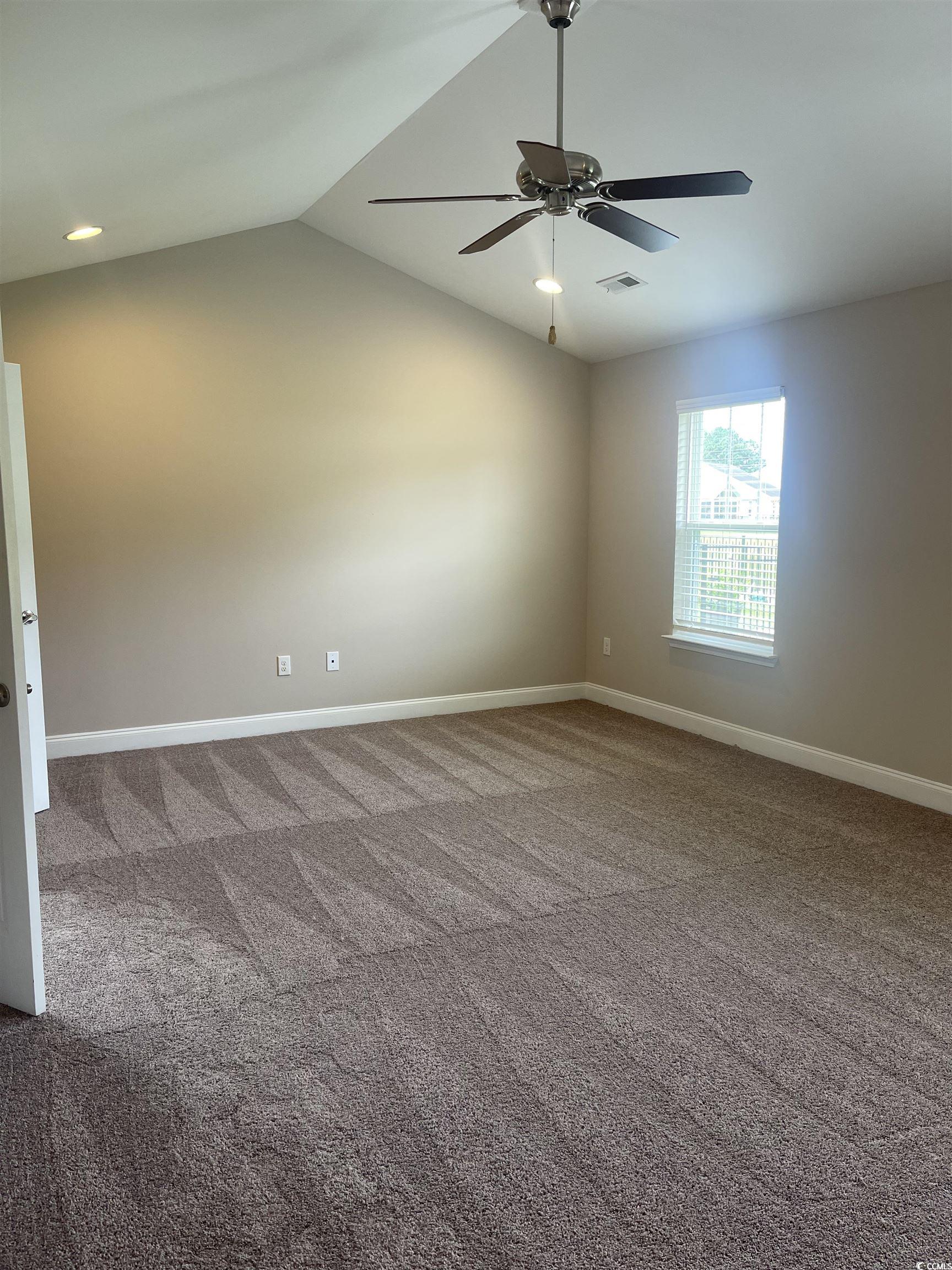 128 Cloey Road Myrtle Beach, SC 29579 - Photo 16 of 22 Master with carpet flooring and lofted ceiling