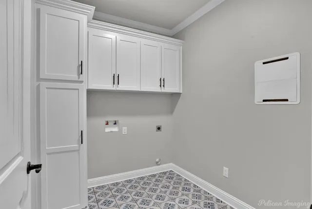 a large kitchen with kitchen island a sink stainless steel appliances and cabinets