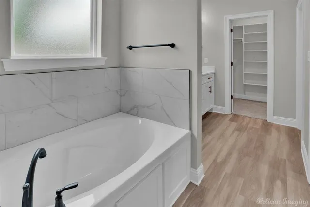 a kitchen with a sink and a fireplace