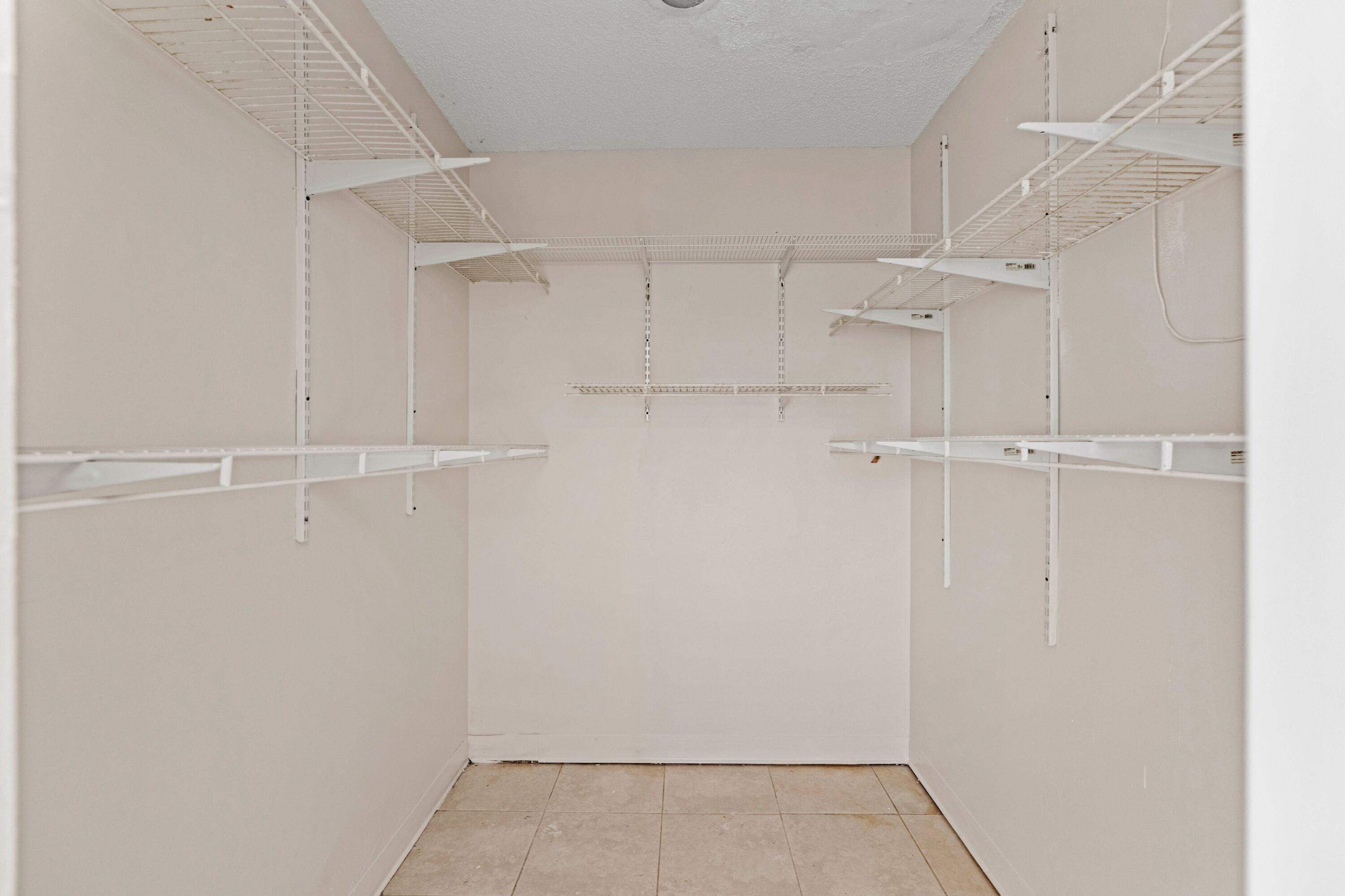 5949 Westfall Road Lake Worth, FL 33463 - Photo 10 of 23 Primary Bedroom