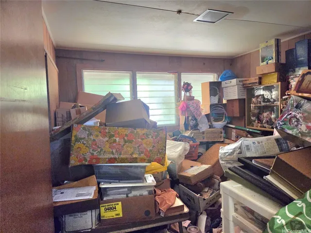 a view of a chairs and tables in the back yard of the house