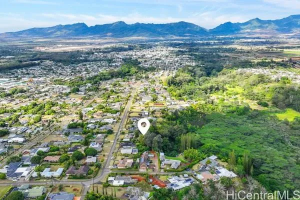 a view of a pathway both side of yard and green space