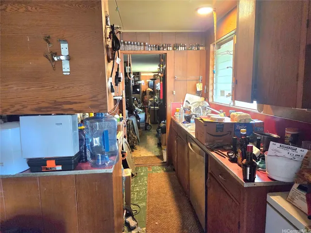 a view of kitchen and dining room with furniture