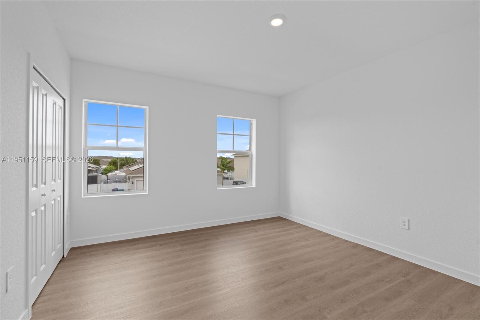 13355 Southwest 272nd Lane Homestead, FL 33032 - Photo 28 of 35 an empty room with windows