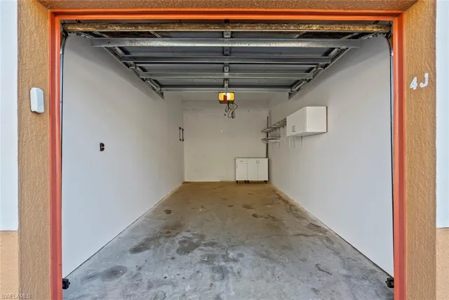 a view of a room with a large window