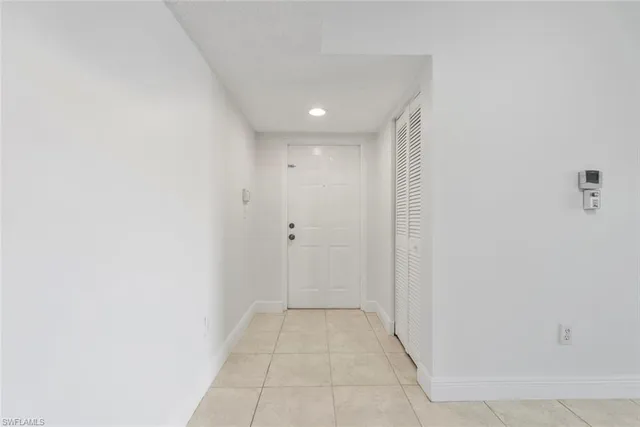 a view of a kitchen with the sink