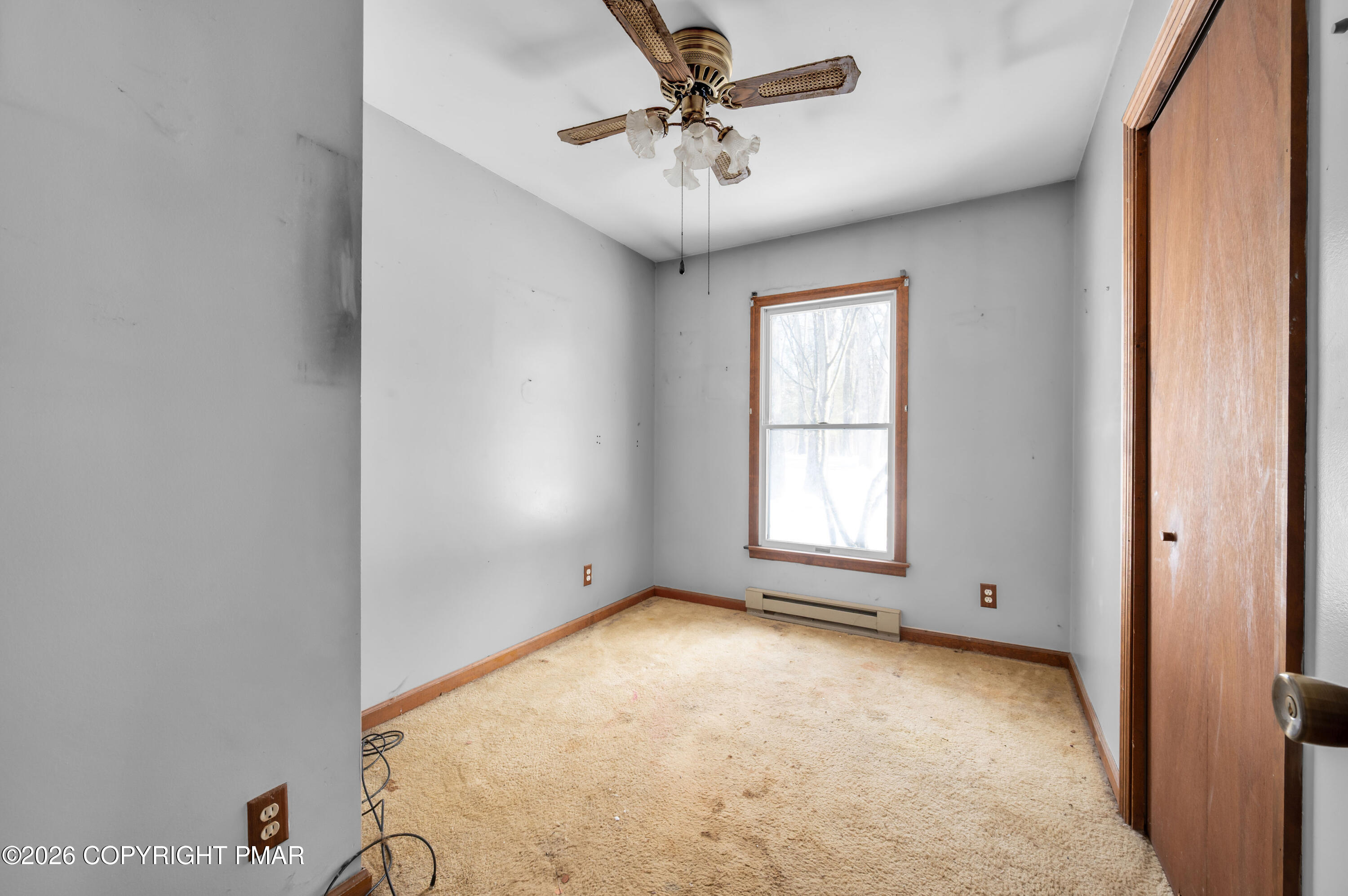 401 Schoolhouse Road East Stroudsburg, PA 18302 - Photo 13 of 21 a view of empty room with window and ceiling fan