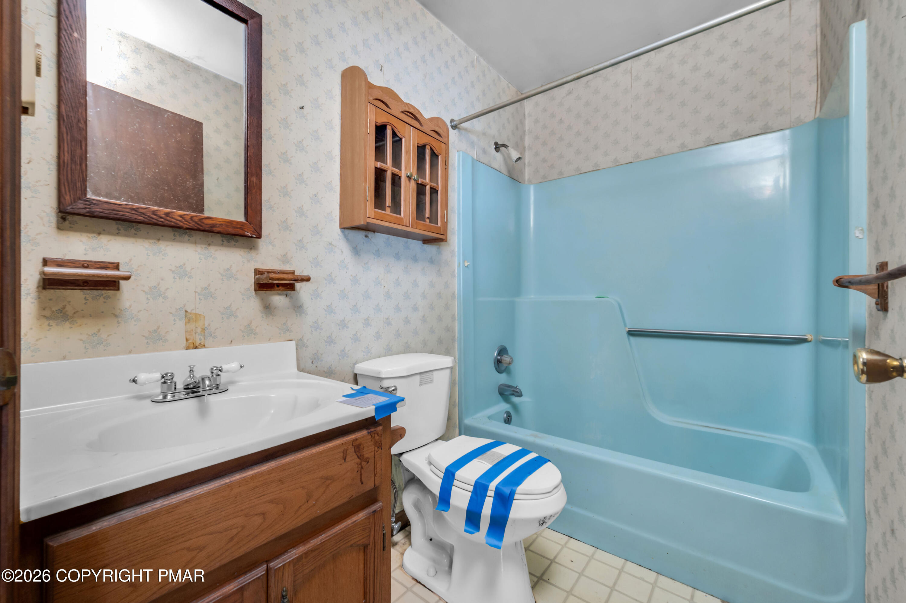 401 Schoolhouse Road East Stroudsburg, PA 18302 - Photo 14 of 21 a bathroom with a sink a toilet and shower
