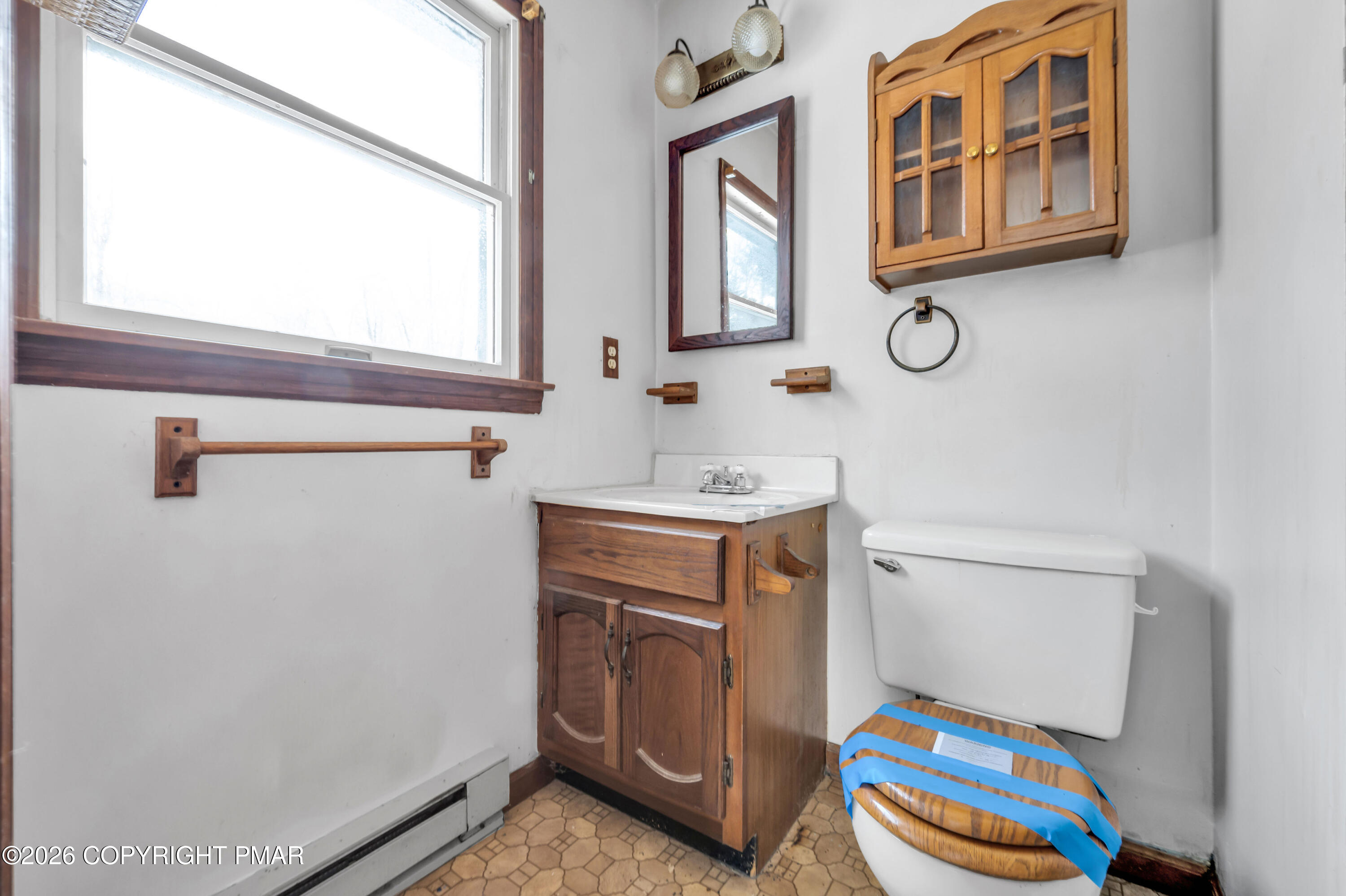 401 Schoolhouse Road East Stroudsburg, PA 18302 - Photo 18 of 21 a bathroom with a sink and a mirror