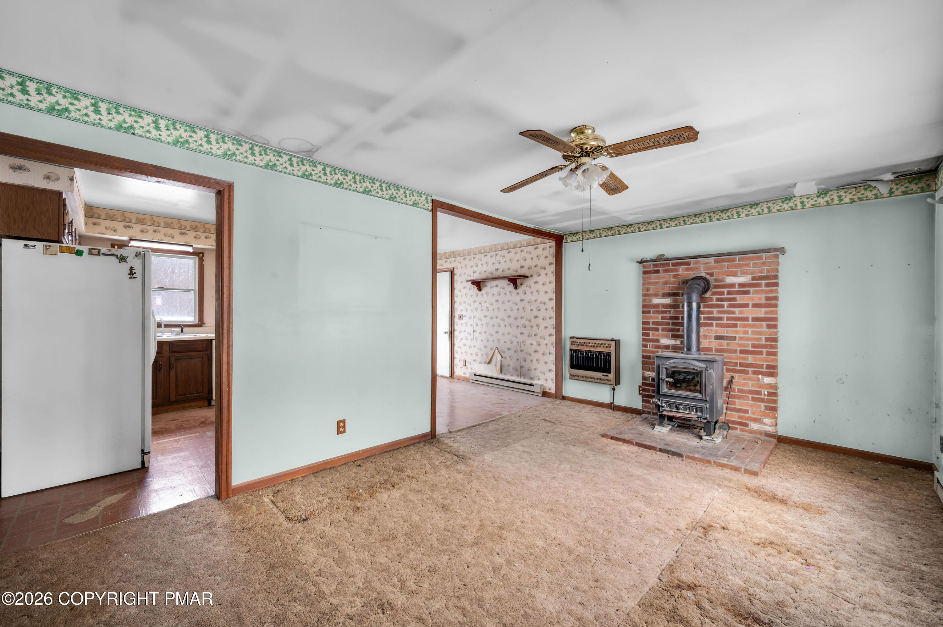 401 Schoolhouse Road East Stroudsburg, PA 18302 - Photo 4 of 21 an empty room with closet and a ceiling fan