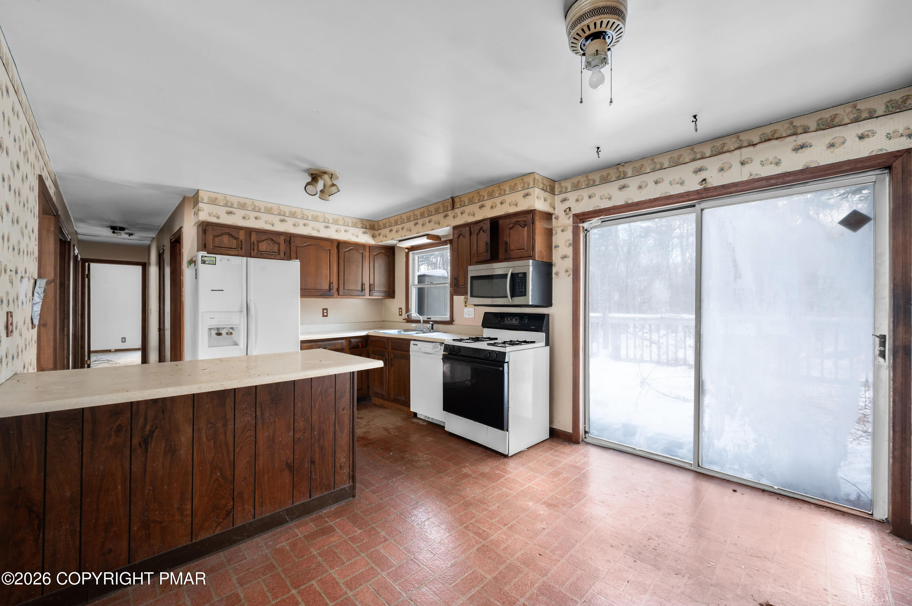 401 Schoolhouse Road East Stroudsburg, PA 18302 - Photo 7 of 21 a kitchen with stainless steel appliances granite countertop a refrigerator and a stove top oven