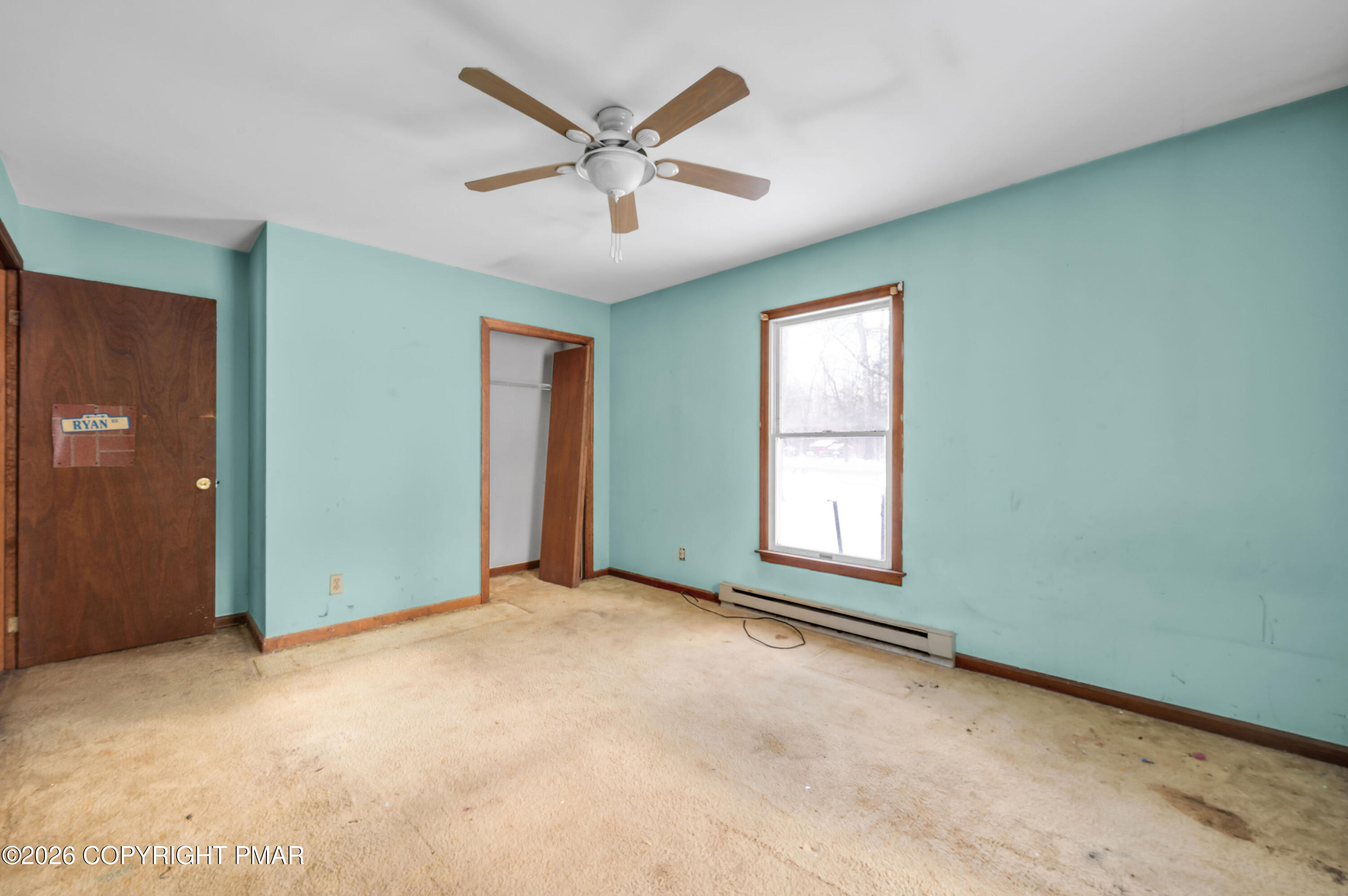 401 Schoolhouse Road East Stroudsburg, PA 18302 - Photo 10 of 21 an empty room with windows and fan