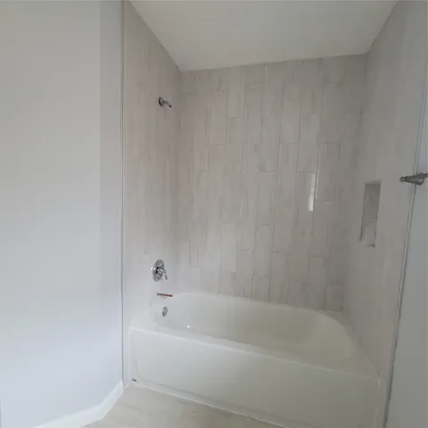 a bathroom with a bathtub