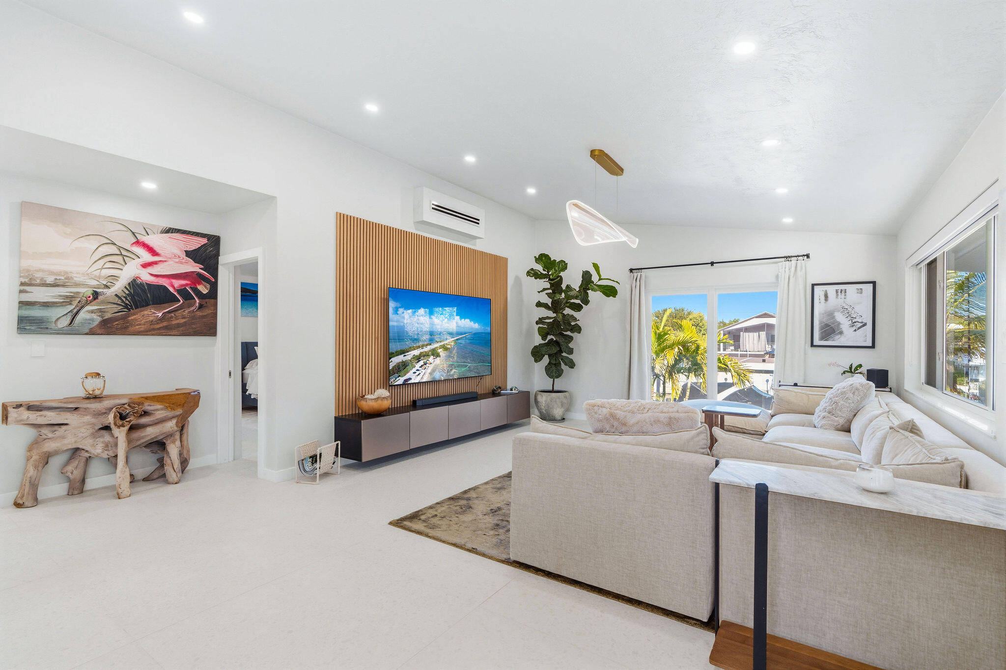 974 Shaw Drive Key Largo, FL 33037 - Photo 21 of 84 a living room with furniture and a flat screen tv